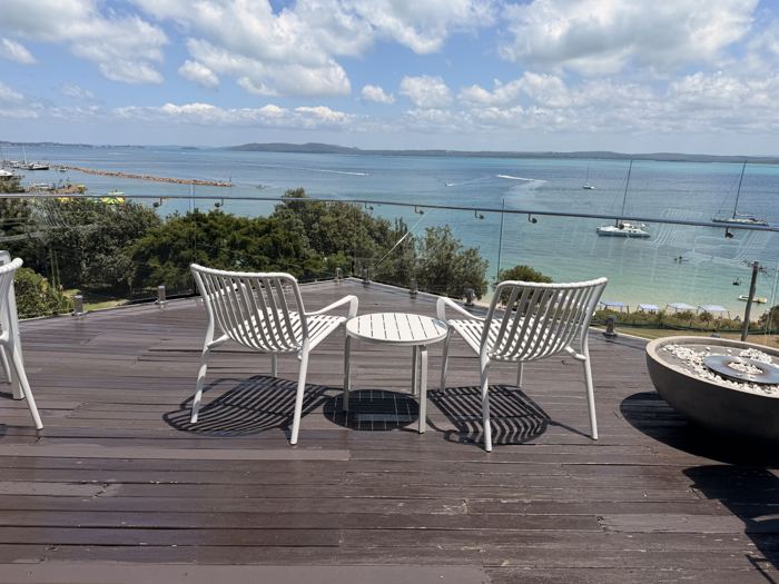Lounge chairs on the deck at Riviera looking over Nelson Bay