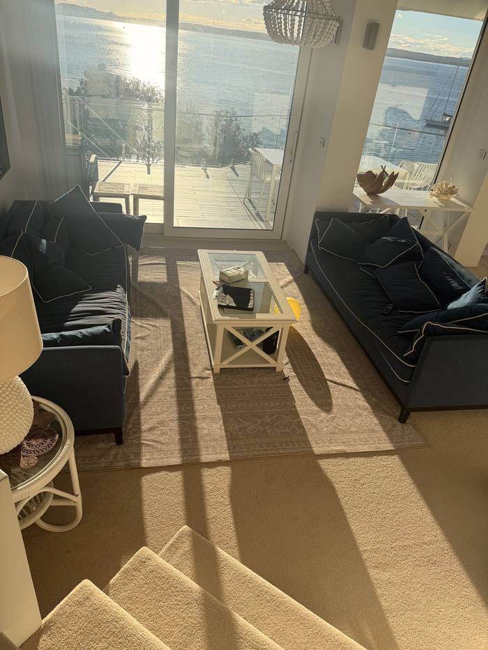 Living room with water views at Riviera holiday house, Nelson Bay