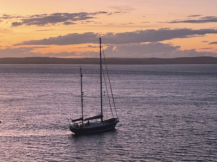 Sailing boat on Port Stephens at sunset